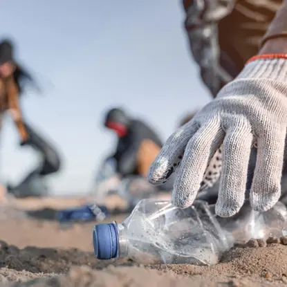 Volunteers collecting plastic waste on a beach