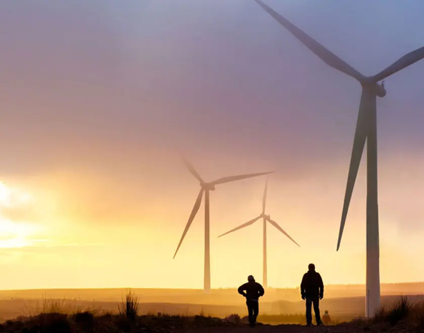 Wind turbines at sunset