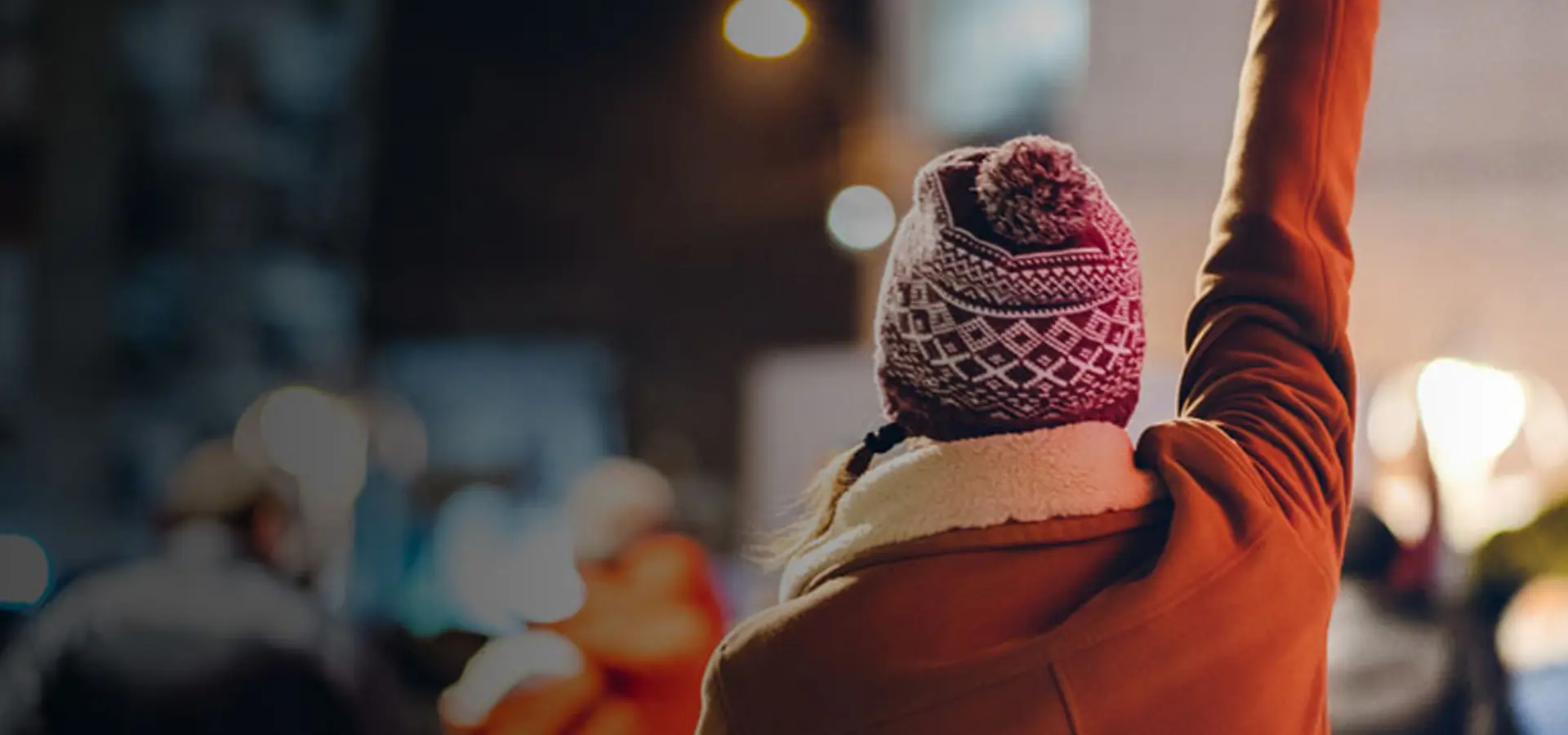 Woman raising her first in protest