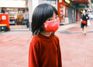 Child wearing a mask