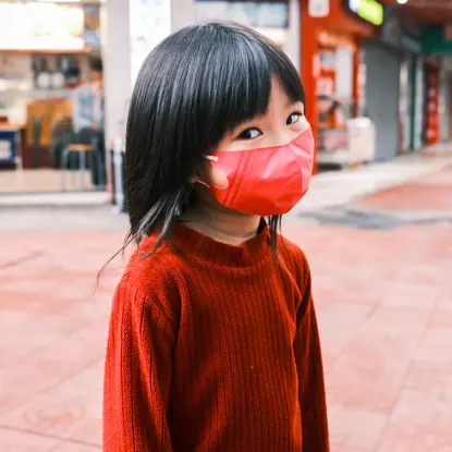 Child wearing a mask