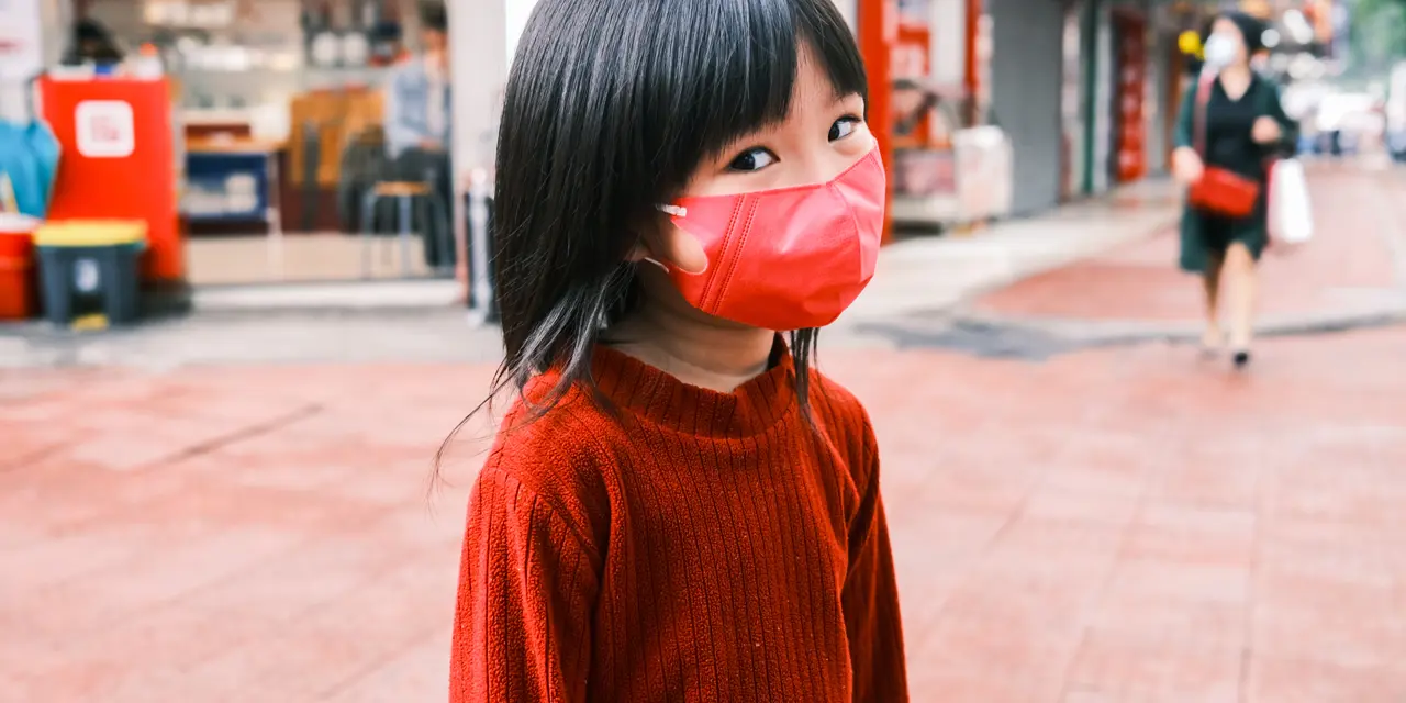 Child wearing a mask